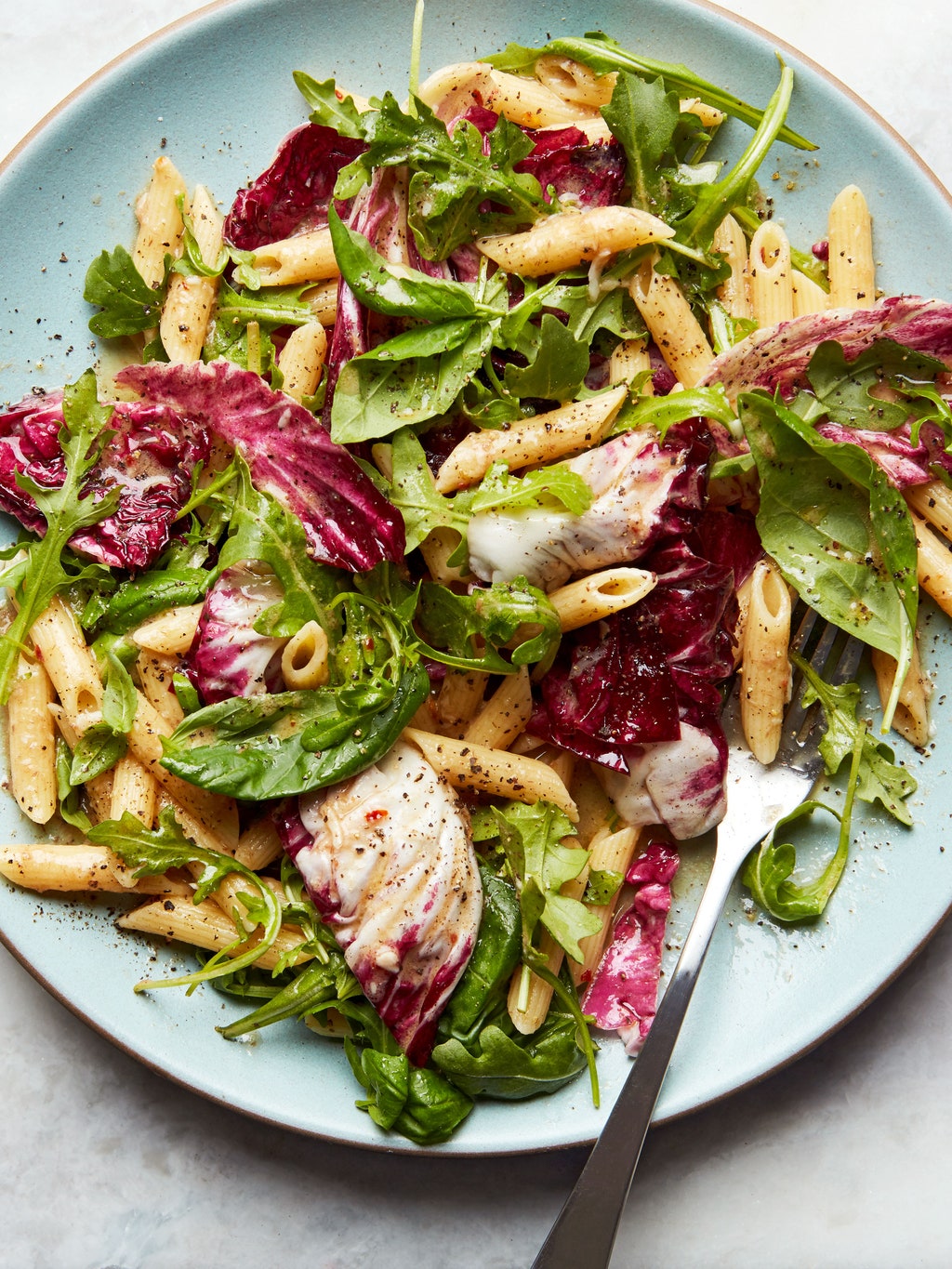 Photo of Chickpea Salad Pasta on a plate with a fork.