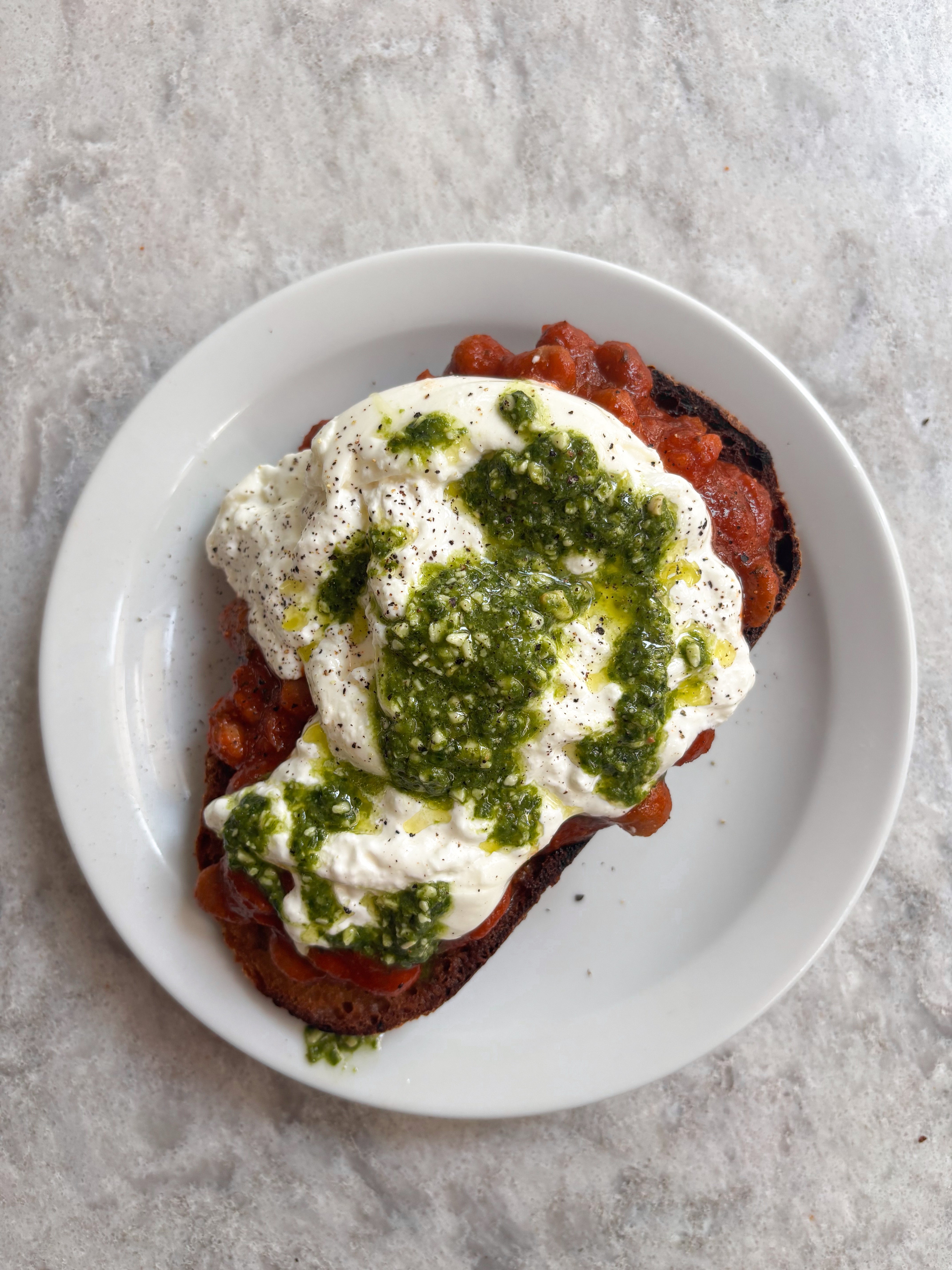 Rich Tomato Baked Beans with Creamy Burrata + Basil Pesto